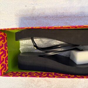 Tory Burch black flip flops size 7